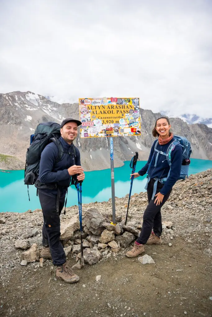 Two hikers at Ala-Köl Pass near Altyn-Arashan in Kyrgyzstan